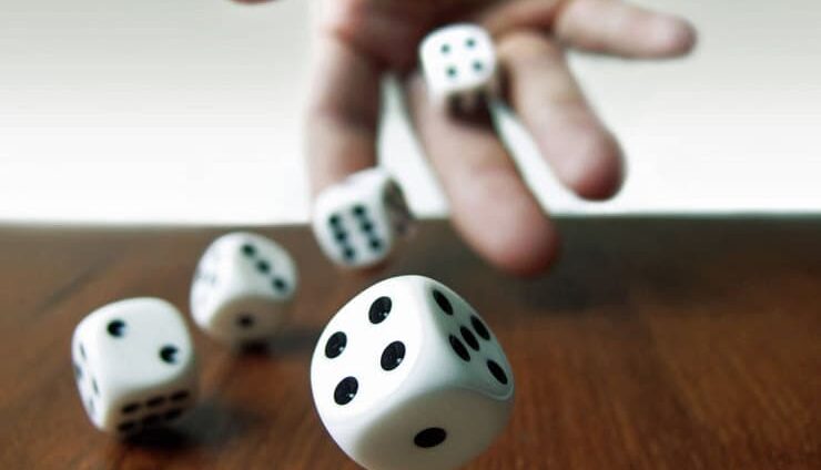 rolling dice stock