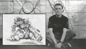 jes goodwin warhammer 40k artist picture in front of a firstborn space marine