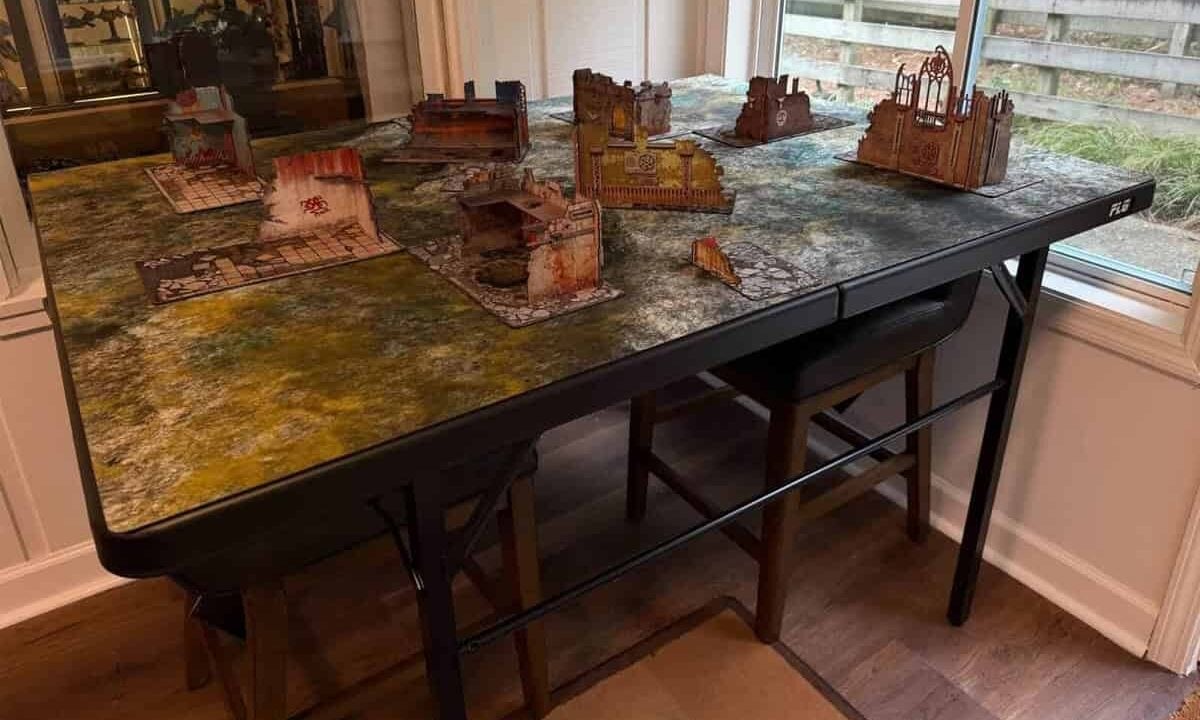 FLG warhammer gaming table set up with terrain on it