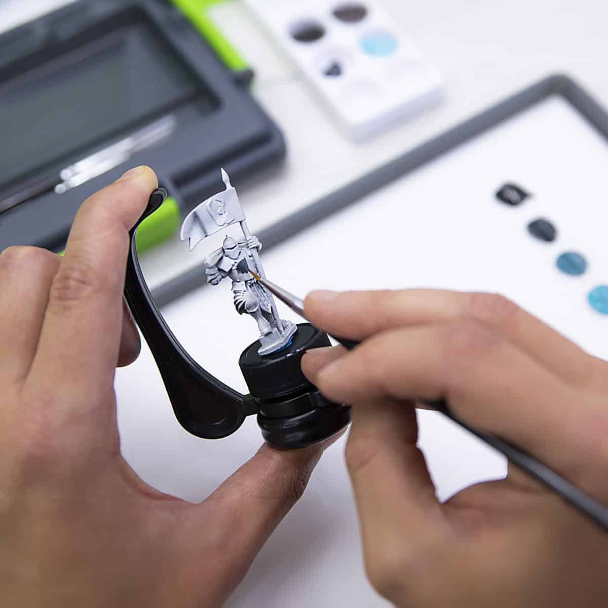 game-envy-hobby-holder-being-used.squae shot miniatures