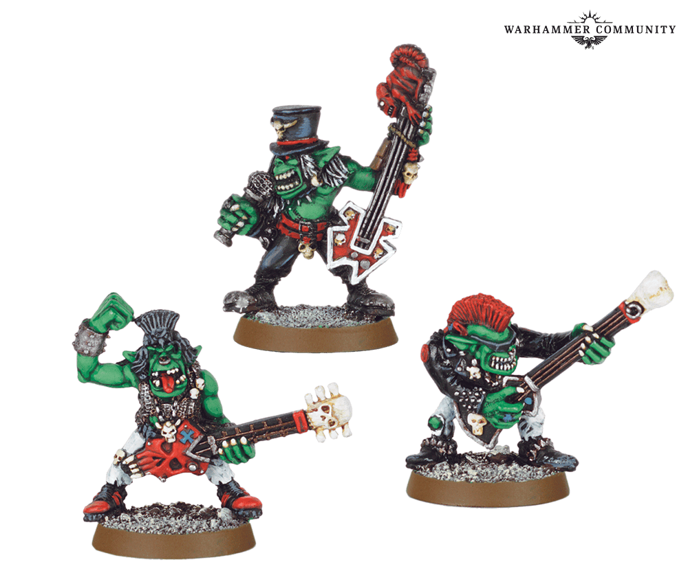 Three classic metal Goff Rockers Ork models playing guitars, one in a top hat
