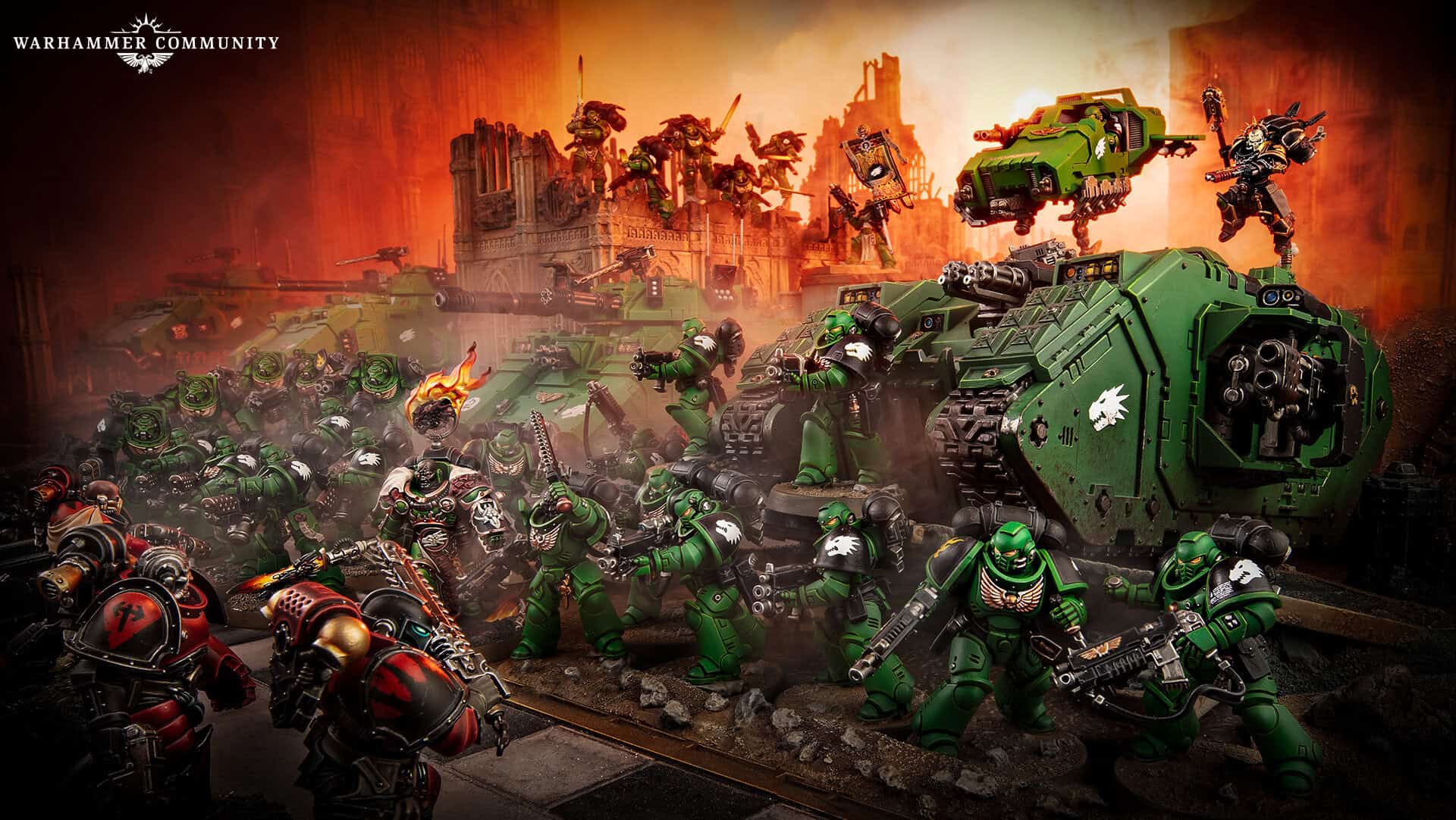 Salamanders Space Marines in green armour advancing across ruined battlefield terrain with flamer weapons raised