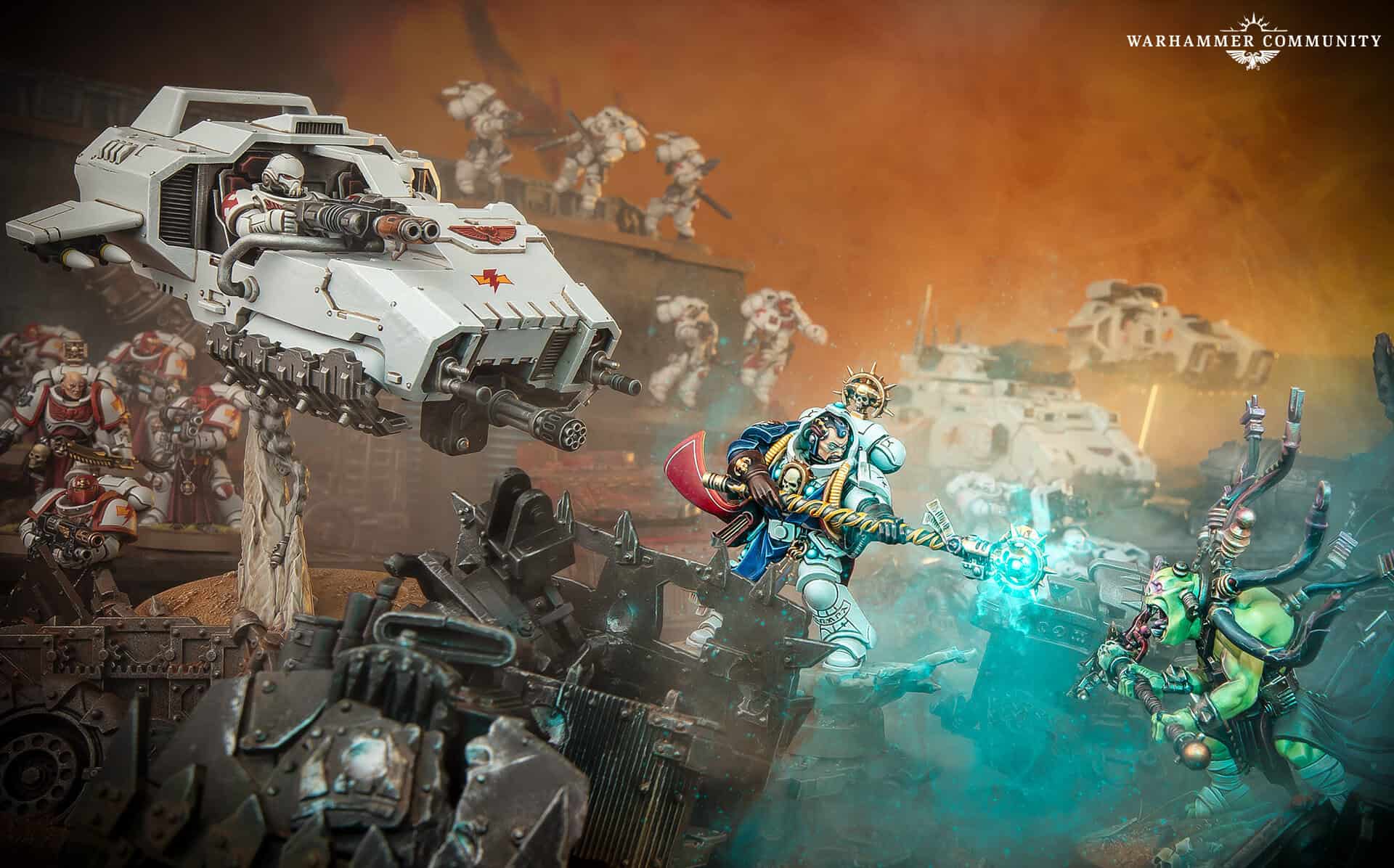 Space Marine Librarian in blue power armour holding a force staff amid battlefield ruins