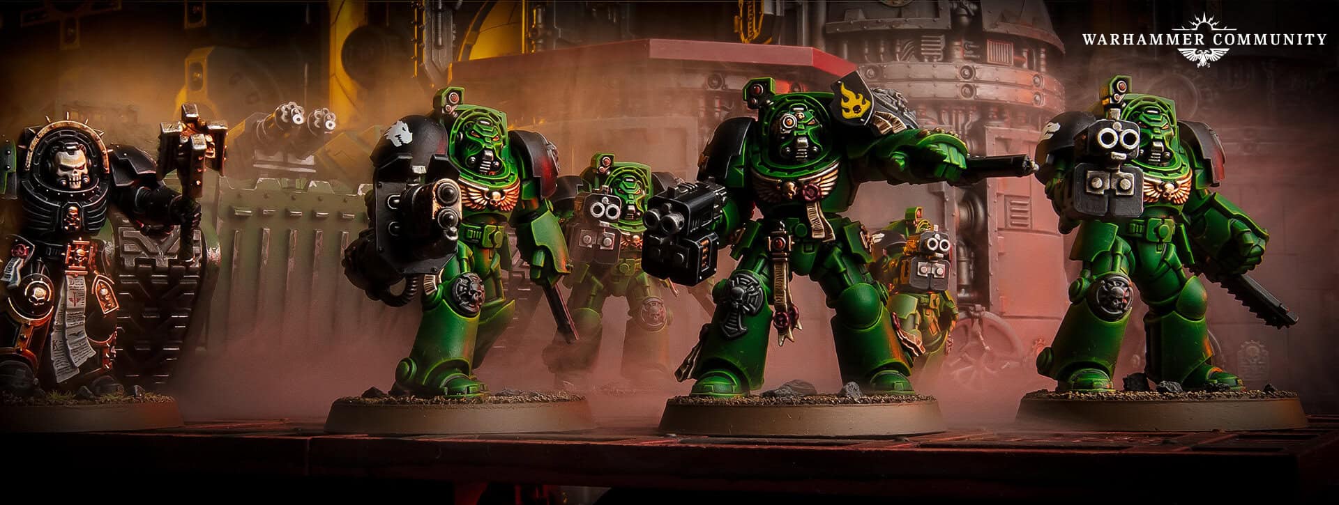 A squad of Space Marine Terminators in bulky armour advancing shoulder to shoulder with storm bolters raised